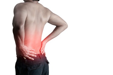 young-man-holding-back-pain-bone-spine-on-a-white-background